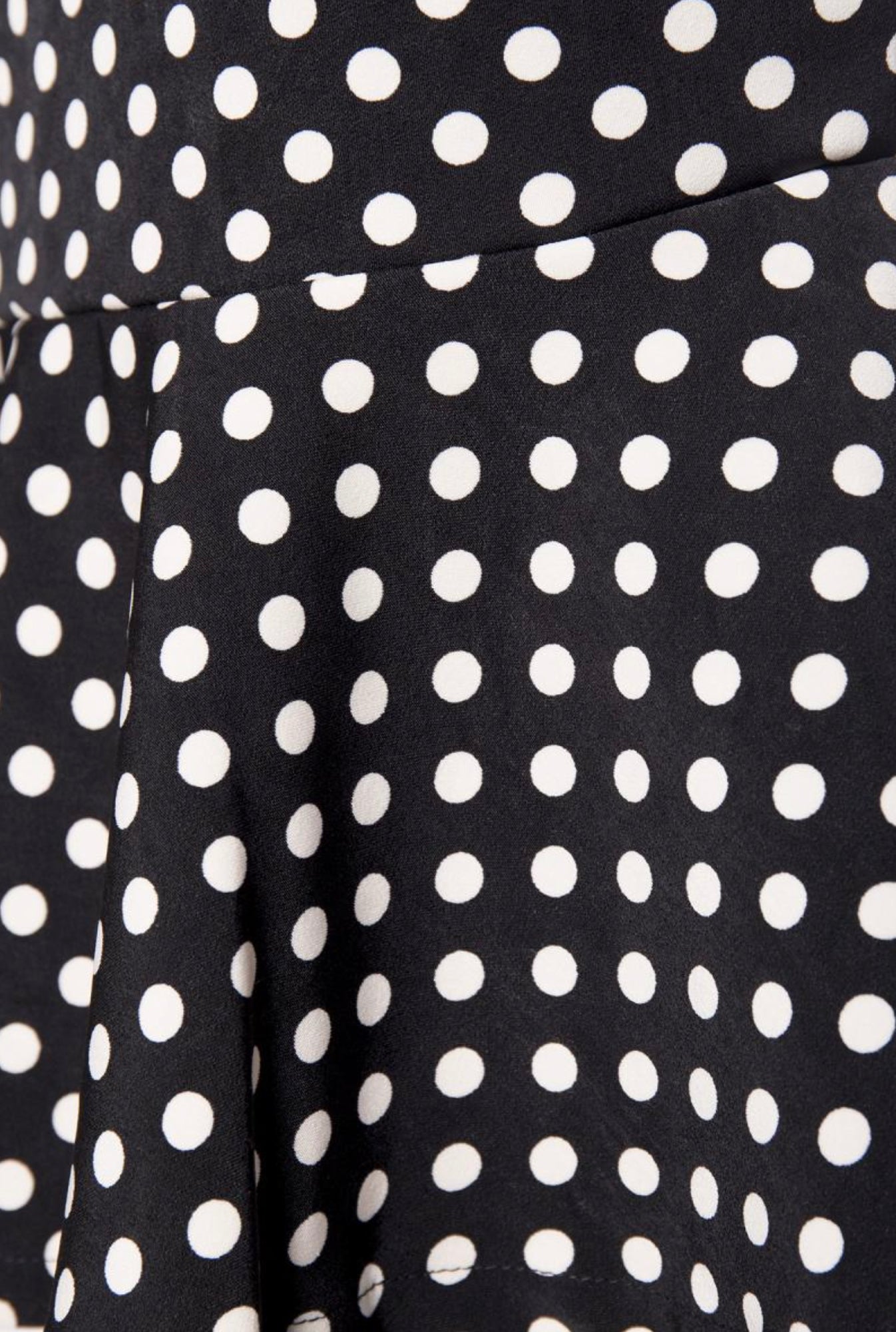Vintage midi-length pencil skirt in black polka