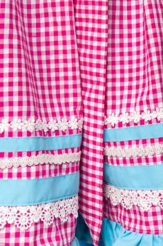 Colorful dirndl with checkered blue-pink apron
